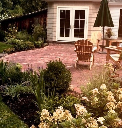 Inspiration For A Mid-sized Timeless Backyard Brick Patio RemodelIdeas For A Mid-sized, Classic Backyard