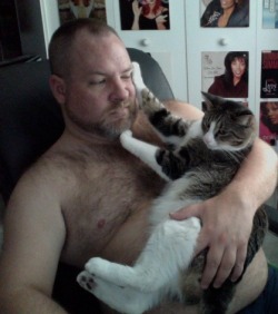 boyswithbeardswithcats:This is my cat.  His name is Chunky.  He makes me talk to the paw sometimes.  :)