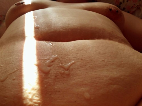 maryneedsmore: Cum on my tum. I love the way the sunlight from the opening in the curtain falls acro