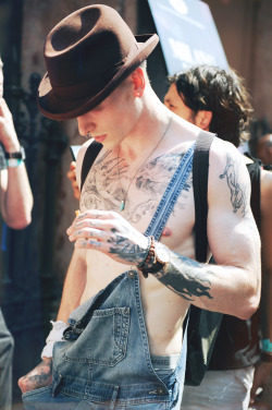 ohthentic:  giackit:  Male model, Jake Hold, showing off his tattoos in a vintage denim overall at Milan Fashion Week. Photo by Giacomo Cabrini  all queer 