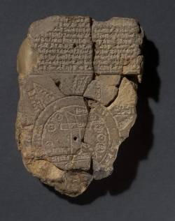 historical-nonfiction:  Both a cuneiform inscription and a map of the world. This Babylonian tablet shows (unsurprisingly) Babylon as the center of the world — the rectangle in the middle of the circle. Assyria, Elam and other places are also named.