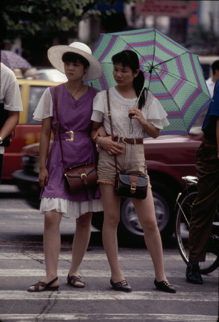 20aliens: CHINA. Shenzhen. Hong Kong’s fashion sense can be seen to influence the dress of Shenzhen’s youth. 1992. Ian Berry 
