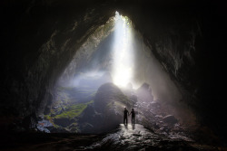 nubbsgalore:  photos by john spies of the the sơn doòng cave in vietnam. at 200 metres high, 150 metres wide and five kilometres long, it is the biggest cave in the world — so large, it has its own river, jungle and even climate. it also contains the