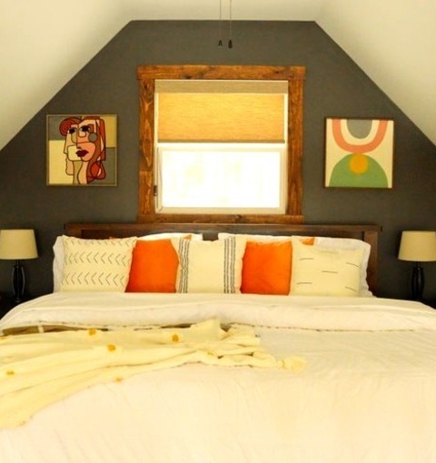 Bedroom - Modern Bedroom Inspiration For A Small Modern Loft-style Medium Tone Wood Floor And Brown Floor
