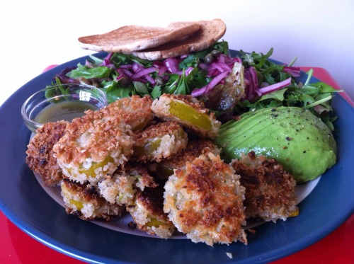 Fried green tomatoes, avocado, salad with pickled red onions and capers, toasted sandwich thins and hot sauce (Home meal)
Fried green tomatoes
Slice green tomatoes into half centimetre rounds and season with salt and pepper.
Dredge in flour, then...