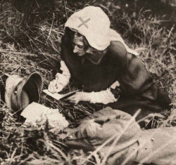 A nurse writes a dying soldier&rsquo;s last words in France, 1917.