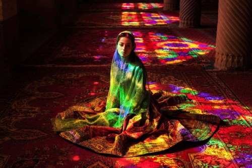 letswakeupworld:A woman sits at the Nasir al-Mulk mosque in Shiraz, Iran. (Photo Credit: Mihaela Nor