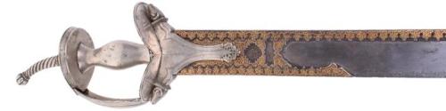 Gold inlaid khanda sword with silver basket hilt, India, 18th century.from C and T Auctioneers