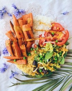 annietarasova:  Roasted sweet potato, rice, green salad and cous cous drizzled with turmeric tahini dressing, YES Thank you so much for 70k, this is crazy 🍨🍴🍊🍪🍌  Instagram: @annietarasova 