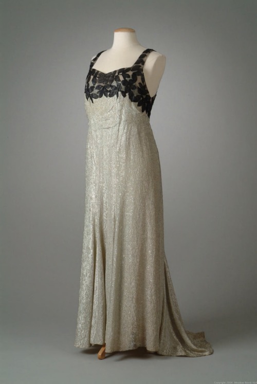 Dinner dress, Peggy Hoyt, silver brocade tissue trimmed with lace, 1937.Meadobrook Hall Historic Cos