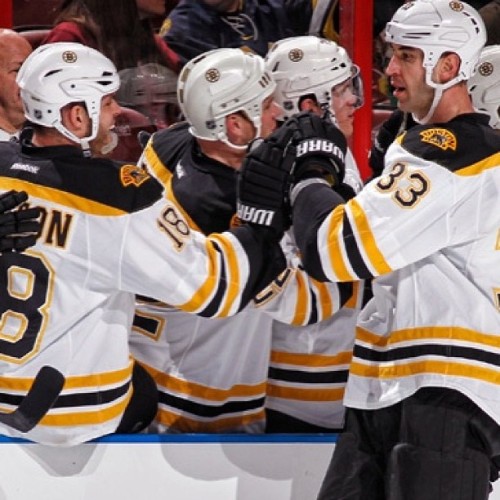 A focused Zee heads thru the fist bump line as teammates congratulate him on the eventual GWG. #nhlbruins