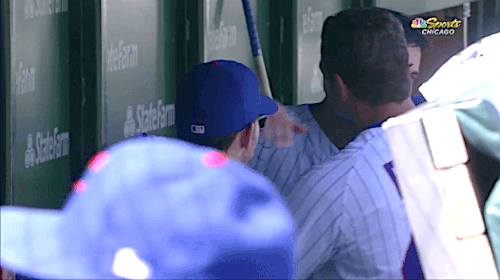 Anthony Rizzo congratulates Cole Hamels after Hamels left the game in his first start after returnin
