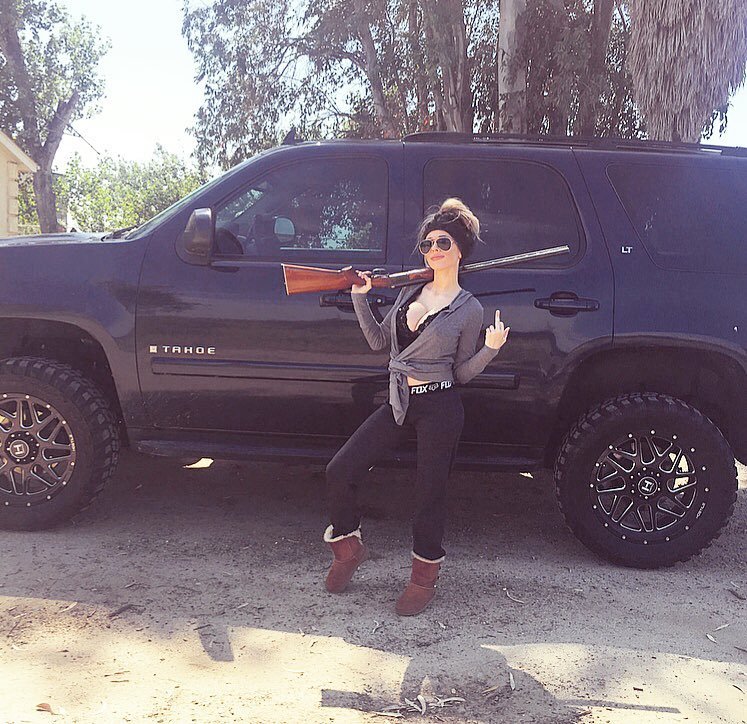 Peachy little over- protective outlaw.  Lift, tires, rims done by (show off ) in