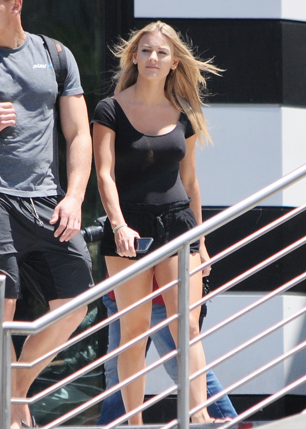I actually did get a few shots of her before she disappeared behind her boyfriend.
