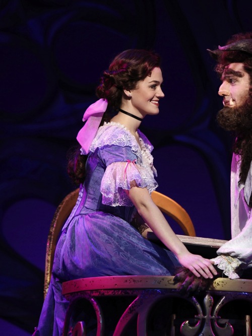 Comparing Beauty And The Beast: Belle In Pink Library Dress