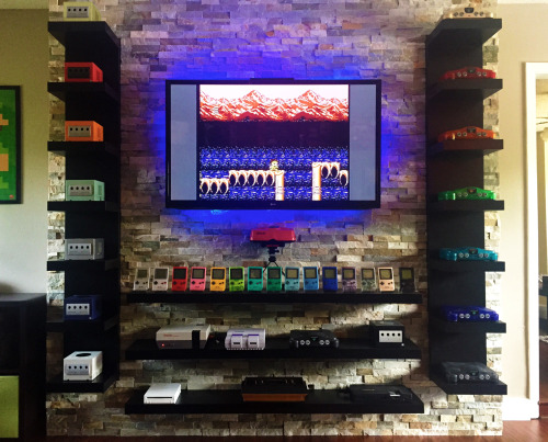 isquirtmilkfrommyeye:  So this is my new game room. My friend @r0ck3r-10 was nice enough to let me borrow the N64′s so I could take the pictures since I haven’t gotten around to buying them yet.
