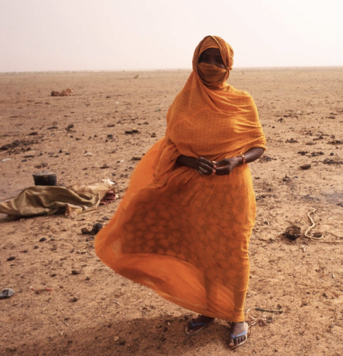 A slave cooks in the desert June 15, 1997 near Chegar, Mauritania.&gt; Photo: Malcolm Linton.In 1981