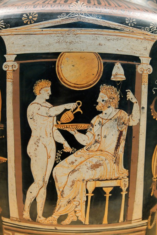 sporadicq: A youth pours a libation to the deceased within a naiskos, a scene that may also represen