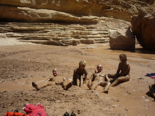 Nude mudbath
