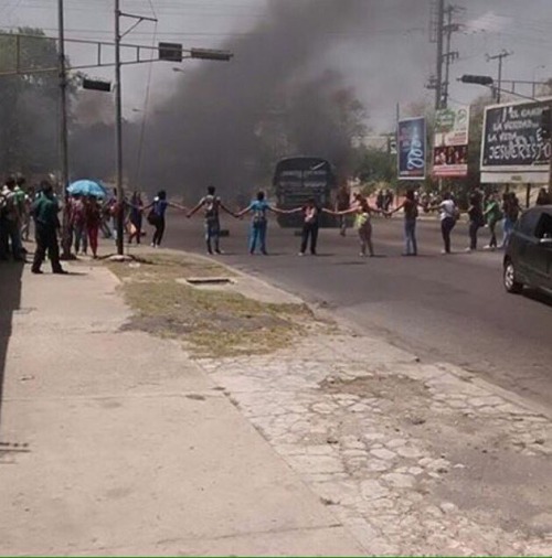 ironhoes:These are pics of the protests occurring in Venezuela right now. The people are going to th