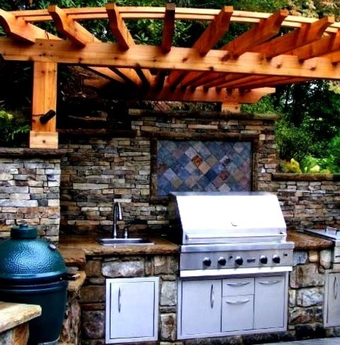 Patio Pergola In AustinInspiration For A Mid-sized Timeless Backyard Patio Kitchen Remodel With Decking