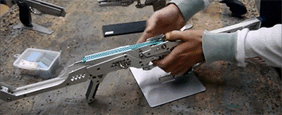Badass Full Metal Rubber Band Guns! Full article  Another video into gif :3