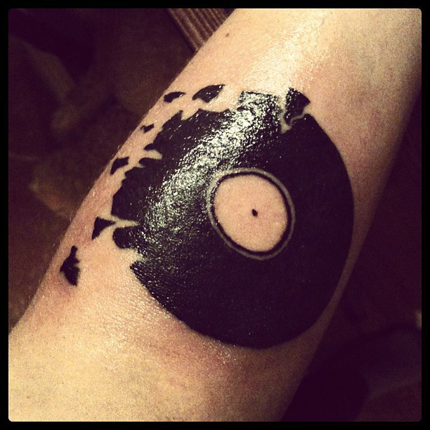 Vinyl record sampling tattoo done by Orlando Guerra at sunset tattoo el  paso tx  rtattoos