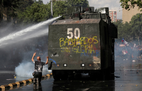 PHOTOS: New protests rage in Chile as Pinera fires ministersChileans took to the streets again on Tu