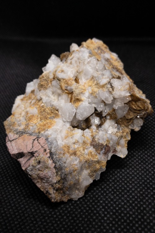 Tinzenite and Quartz on RhodoniteLocality: Molinello Mine, Ne, Graveglia Valley, Genova Province, Li