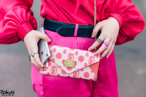 19-year-old Tokyo music school student Shoko on the street in Harajuku wearing an all pink mostly vi