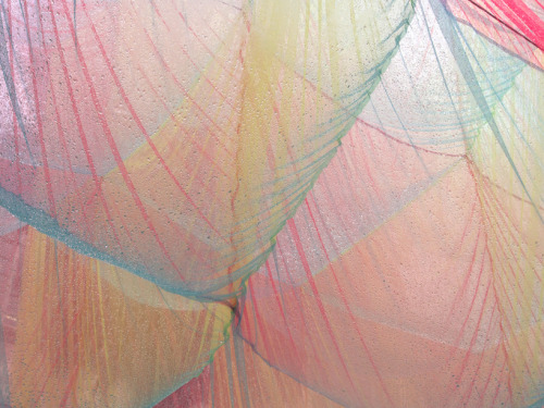 Soft semi-transparent layers of polyester fabrics create the  &ldquo;Cubic Prism&rdquo;