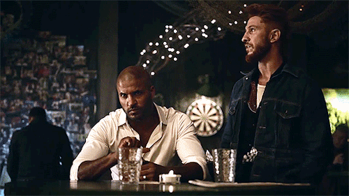 damnyourdarkeyes:  Coin tricks, is it? Pablo Schreiber as Mad Sweeney, Ricky Whittle as Shadow Moon, American Gods – The Bone Orchard (S01E01)