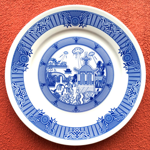 escapekit:  Calamityware  Pittsburg based designer Don Moyer creates traditional blue porcelain dinner plates with one major twist. He adds flying monkeys, a UFO assault, and giant gurgling sea monsters to create a plate series he calls Calamityware.
