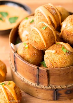 thecraving:  Cheesy Yuca Balls with a Chipotle
