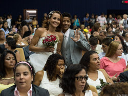 gaywrites:  The world’s largest communal same-sex wedding ever took place this Sunday, when around 130 same-sex couples participated in a mass wedding in Rio De Janeiro. While Brazil’s new marriage equality law has not been officially passed, some