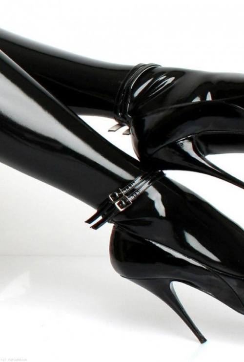 Stretching long legs outward, showing out those beautiful heels pushing them toward your mouth and w