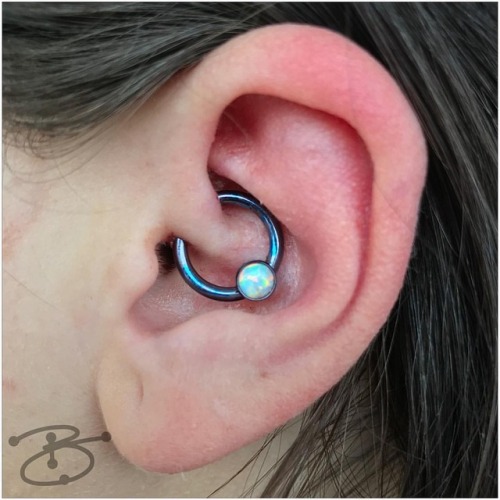 Fun Daith on @trishacenta529 with a 12g Titanium CBR featuring a White Opal#piercingsbybelcher #da