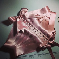 gothiccharmschool:  lovelyrats:  sinandsatin:  I’m so glad this Antique Rose colored satin #ribboncorset turned out so lovely. I used four lacing bones at center front and back. Two very stiff ones at center front and more flexible steel lacing bone