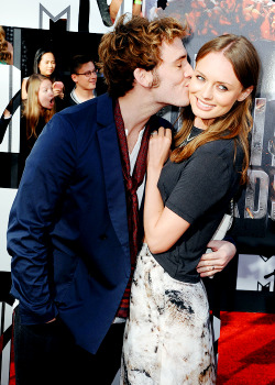 dailysamclaflin:  Sam Claflin and Laura Haddock attend the 2014 MTV Movie Awards at Nokia Theatre L.A. Live on April 13, 2014 in Los Angeles, California. 