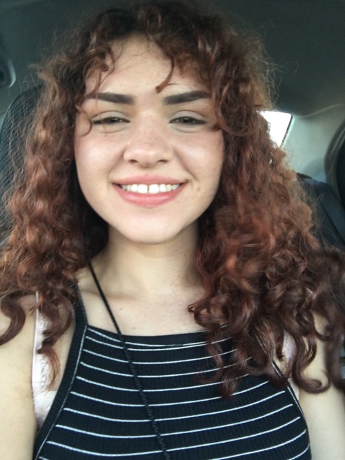 the sun lights my fiery curls
