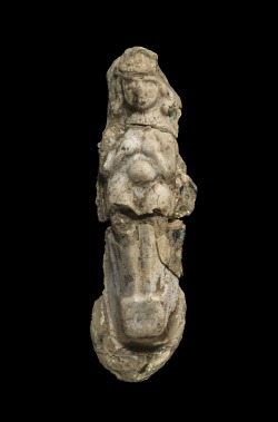 This pendant, one of the earliest types of glass found in Mesopotamia, may represent the goddess Ishtar or one of her devotees. The Mesopotamian goddess of fertility and abundance, Ishtar was a popular deity in the ancient middle east, with close connections to other ancient goddesses like the Phoenician Astarte and Greek Aphrodite. The protruding belly and large breasts on this figure may represent the desire for a healthy pregnancy or gratitude for a safe delivery, and a plea to the goddess for her support, of an ancient woman.Pendant with Nude Female, Northern Mesopotamia, 1500-1200 BCE, 55.1.64.