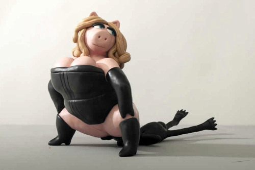 21st-digit:  Yep, we always knew Miss Piggy was dominant, so it makes sense that, in private, Piggy was fisting Kermit senseless. Mistress Piggy Rocks! Where do I buy these sculptures? 