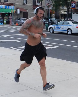 nomatch4me:  CM Punk running outside Barclays Center, 7/15/13  Can’t believe he went running in this heatwave. The fans didn’t bother him, just waved, said hi, and let him run by. He waved back while singing to himself.  Fuucckkk!!!! O.o