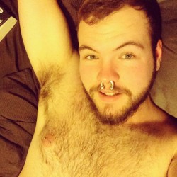 ferrum-animam:Lazy night in bed watching Orange is the new black! #selfie #me #gay #gaycub #gaymer #geek #scruff #beard #septum #nipplepiercing