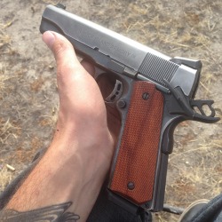 coffeeandspentbrass:  My 1911 is purrty.