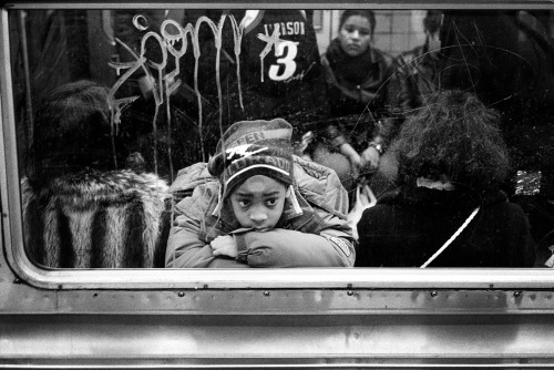 Boy daydreaming on the subway