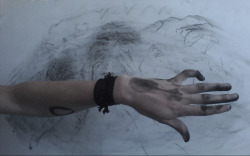 xiza:  rk45:  I started this drawing but it wasn’t going well and I got too frustrated so I smudged it up and then later ripped it up. But I thought the charcoal smudges on my hand were pretty neat   follow for similar posts