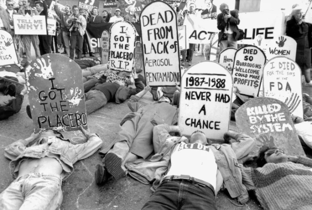 ACT UP protesters outside the FDA headquarters in Rockville, Maryland on October 11, 1988. They demanded the release of experimental medication for those living with HIV/AIDS with slogans reading: 'Never Had A Chance.' 'I Got the Placebo' and 'I Died for the Sins of the FDA.' 