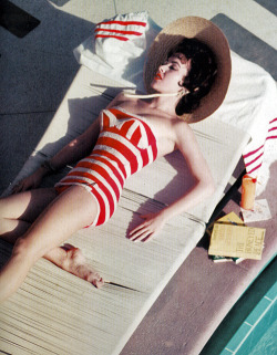 vintagegal:  Mara Lane in a Jantzen swimsuit at the Sands Hotel, Las Vegas, NV. Photograph by Slim Aarons, 1954 (via) 