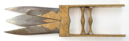 Gold inlaid Indian scissor katar, early 20th century.from Auctions Imperial